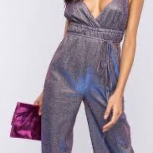 Two metallic jumpsuits.